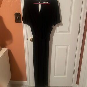 Black jumpsuit with pockets! Short sleeves. Takara